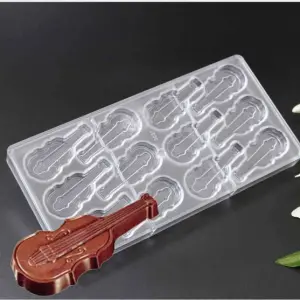 Polycarbonate 12 Cavities Musical Violin Guitar Shape Chocolate Mold (Output Weight Approx: 15 Grams Per Cavity)